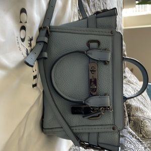 Baby blue coach mini sachel. Lightly used.